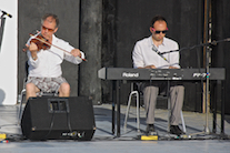 Larry Parks on fiddle accompanied by Kolten MacDonell on keyboard