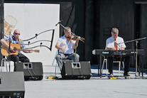 Rodney MacDonald on fiddle, accompanied by Lawrence Cameron on keyboard and Mike Barron on guitar