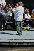 The Cape Breton Fiddlers’ Association plays its second group number in tribute