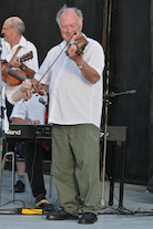 Eddie Rogers directing and on fiddle