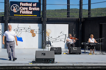 Rodney MacDonald step‑dancing to the music of Dara Smith-MacDonald on fiddle and Susan MacLean on keyboard
