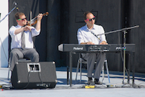 Kyle Kennedy MacDonald on fiddle accompanied by Kolten MacDonell on keyboard