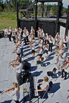 The Cape Breton Fiddlers’ Association plays its second group number in tribute