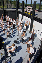 The Cape Breton Fiddlers’ Association plays its second group number in tribute