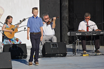 Iain MacQuarrie step-dancing to the music of Howie MacDonald on fiddle, Lawrence Cameron on keyboard, and  Mary Beth Carty on guitar