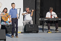 Iain MacQuarrie step-dancing to the music of Howie MacDonald on fiddle, Lawrence Cameron on keyboard, and  Mary Beth Carty on guitar