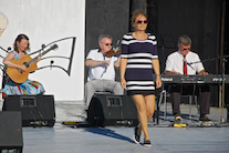 Cheryl MacQuarrie step-dancing to the music of Howie MacDonald on fiddle, Lawrence Cameron on keyboard, and  Mary Beth Carty on guitar