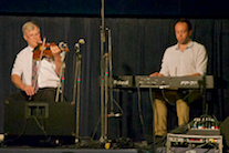 Bernard McDonell on fiddle accompanied by Kolten Macdonell on keyboard