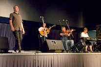 John Pellerin step dancing to the music of Howie MacDonald on fiddle, Cathy Hawley on keyboard, and Mary Beth Carty on guitar