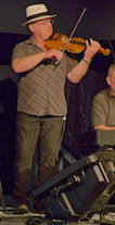 Kyle MacNeil on fiddle