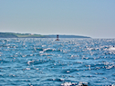 Red buoy at the mouth of the Mabou River