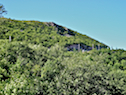 The Cabot Trail near the summit of Smokey Mountain seen from the road below