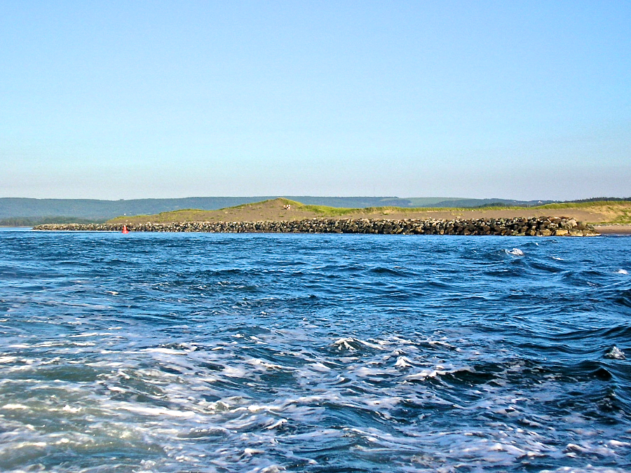 The breakwater and the sand dunes