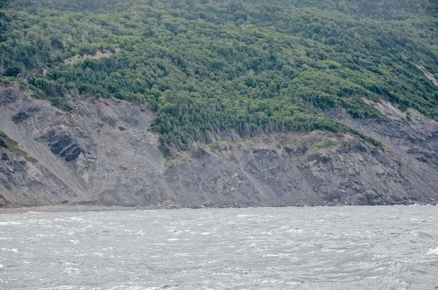 Southern continuation of the shore below the mountain