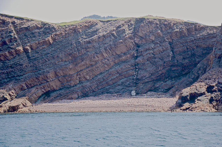Cliff and beach near the tip of Cape St Lawrence