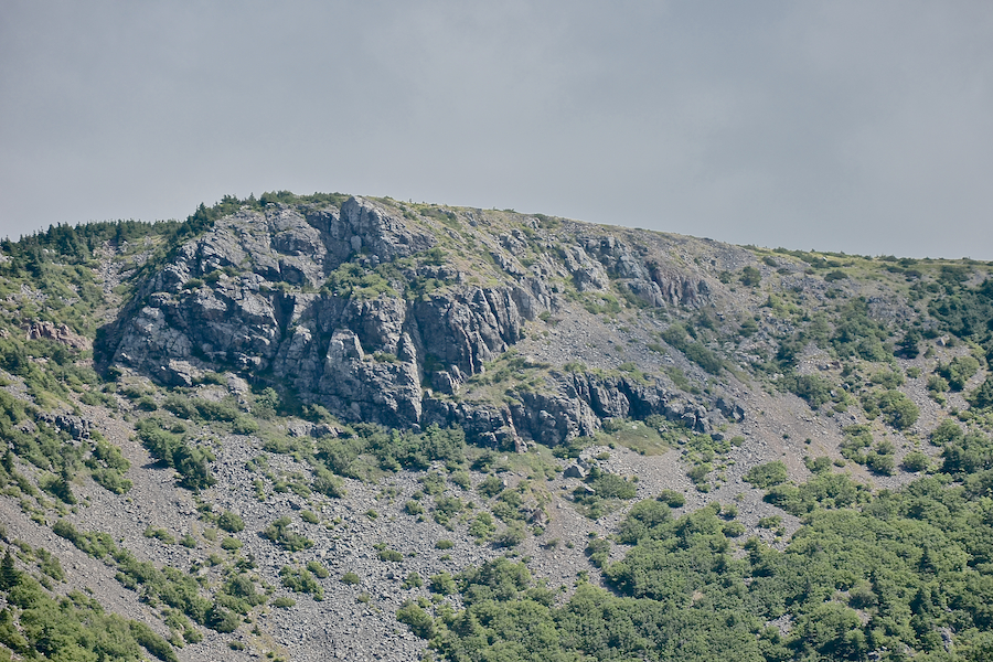The cliff face to the south of the upper peak of “Between-the-Delaneys Mountain”