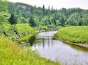 Rock-lined view of the Southwest Mabou River