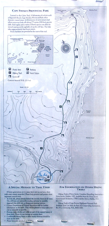 Photo of the Cape Smokey Trail Map at the edge of the Parking Lot in the Cape Smokey Provincial Park