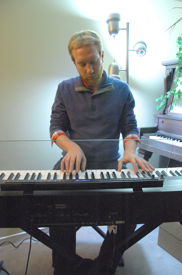 Photo of Adam Young on keyboards