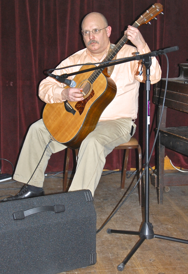 Photo of Michael Kerr on guitar