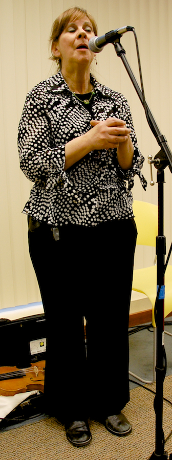 Photo of Margie Waldrum, hostess of the concert, welcomes the audience