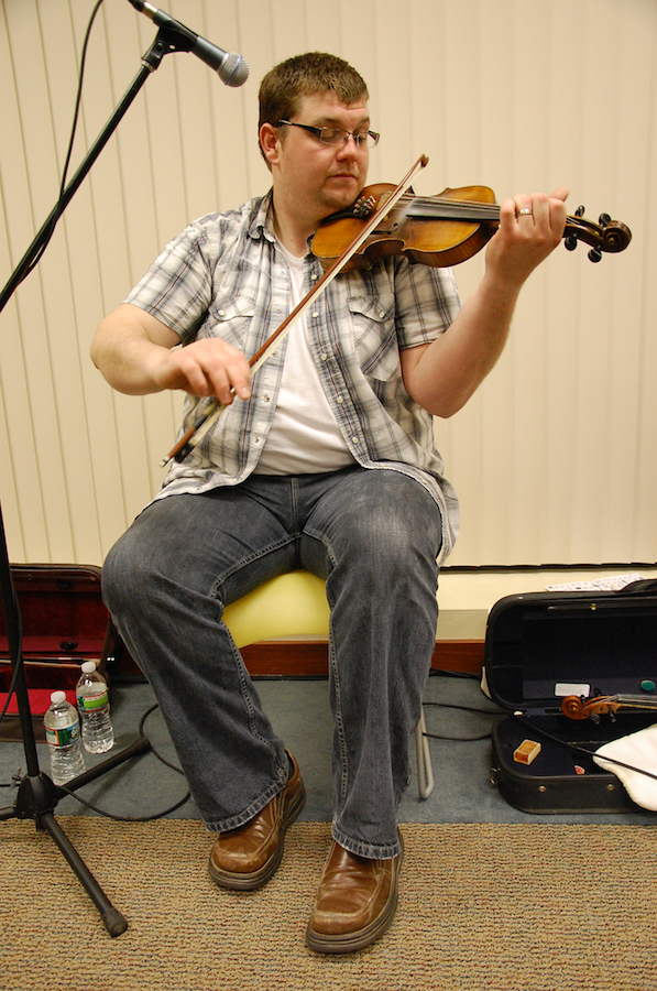 Photo of J. J. Chaisson on fiddle