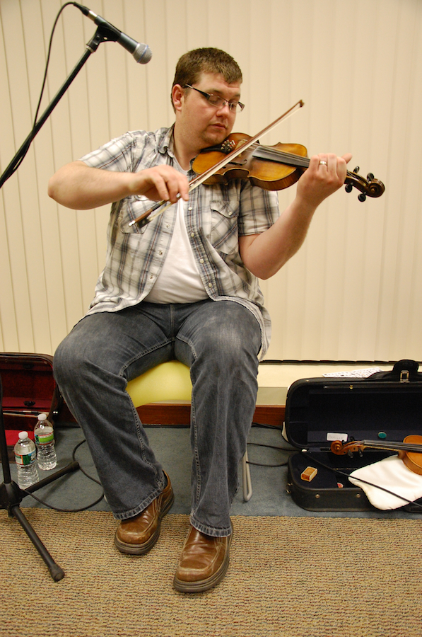 Photo of J. J. Chaisson on fiddle