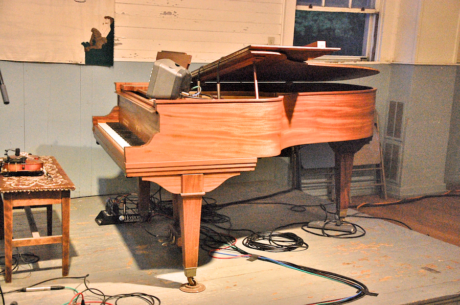 The grand piano in the Nelson Town Hall from the side