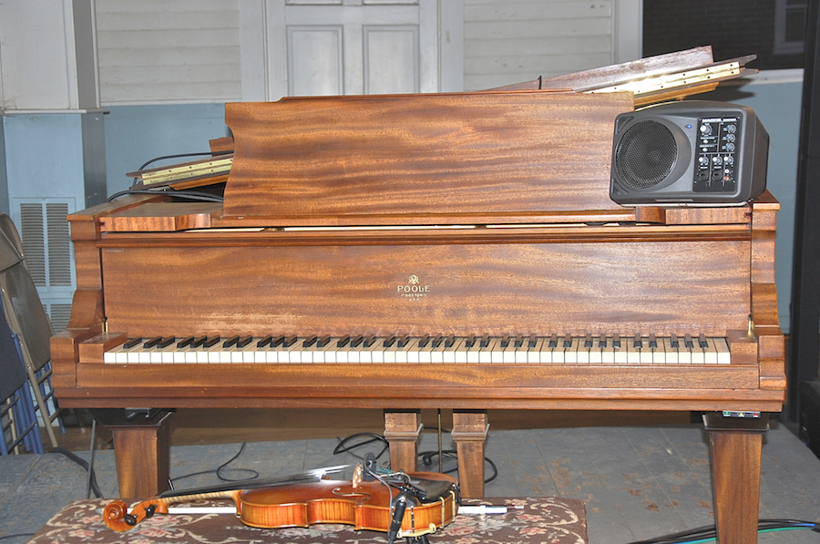 The grand piano in the Nelson Town Hall from head-on